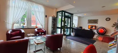 Ein Sitzbereich in der Unterkunft Hotel Deutscher Hof
