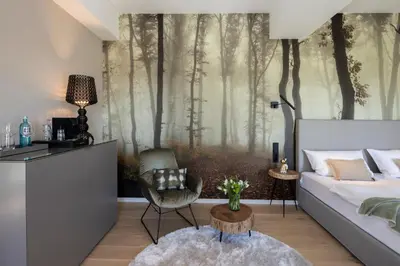 Ein Bett oder Betten in einem Zimmer der Unterkunft Hofgut Wißberg - Das Weinberghotel