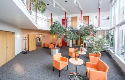 Ein Sitzbereich in der Unterkunft Hotel an der Waldstraße
