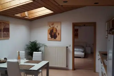 Ein Bett oder Betten in einem Zimmer der Unterkunft TLA Apartment with Garden