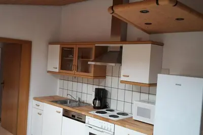 Küche/Küchenzeile in der Unterkunft TLA Apartment with Garden