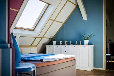 Ein Bett oder Betten in einem Zimmer der Unterkunft Rooftop Penthouse Karlsruhe