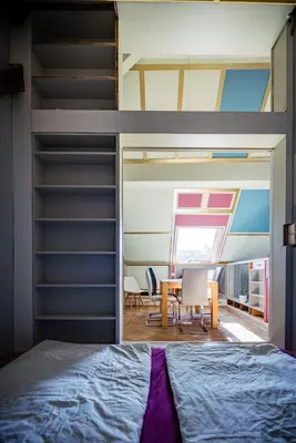 Ein Bett oder Betten in einem Zimmer der Unterkunft Rooftop Penthouse Karlsruhe