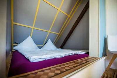 Ein Bett oder Betten in einem Zimmer der Unterkunft Rooftop Penthouse Karlsruhe