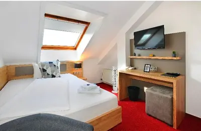 Ein Bett oder Betten in einem Zimmer der Unterkunft Vico's Hotel & Restaurant Asperg