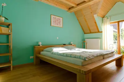 Ein Bett oder Betten in einem Zimmer der Unterkunft Ferienwohnung Pforte 7