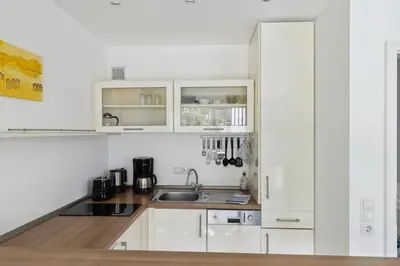 Küche/Küchenzeile in der Unterkunft Belisima Apartments I Ferienwohnungen Deidesheim I Deutsche Weinstraße I Individuell mit Charm I Ruhig am Kurpark I Nähe Supermarkt - Bäcker - Bahnhof
