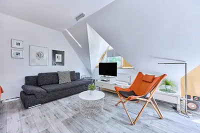 TV/Unterhaltungsangebot in der Unterkunft Belisima Apartments I Ferienwohnungen Deidesheim I Deutsche Weinstraße I Individuell mit Charm I Ruhig am Kurpark I Nähe Supermarkt - Bäcker - Bahnhof