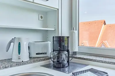 Küche/Küchenzeile in der Unterkunft Belisima Apartments I Ferienwohnungen Deidesheim I Deutsche Weinstraße I Individuell mit Charm I Ruhig am Kurpark I Nähe Supermarkt - Bäcker - Bahnhof