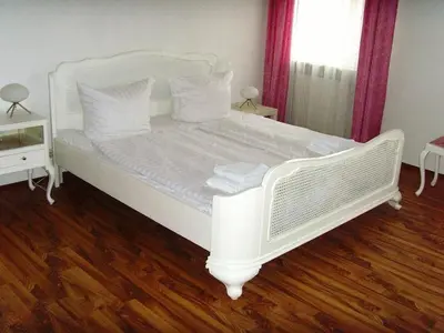 Ein Bett oder Betten in einem Zimmer der Unterkunft Hotel Schlossberg