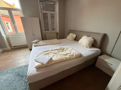 Ein Bett oder Betten in einem Zimmer der Unterkunft Zimmer in Kaiserslautern