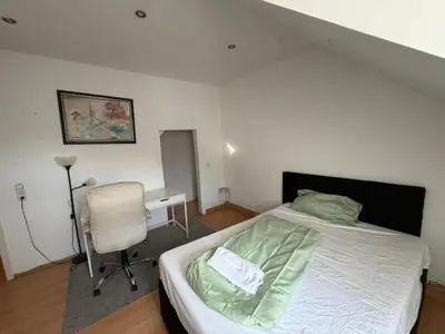 Ein Bett oder Betten in einem Zimmer der Unterkunft Zimmer in Kaiserslautern
