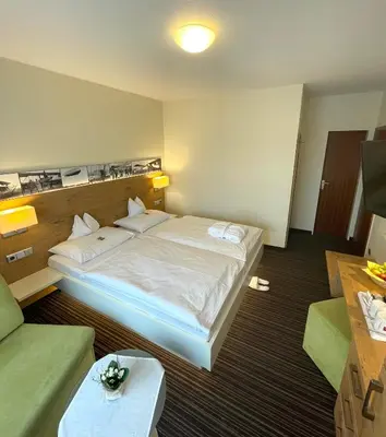 Ein Bett oder Betten in einem Zimmer der Unterkunft Hotel Nothnagel