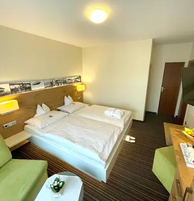 Ein Bett oder Betten in einem Zimmer der Unterkunft Hotel Nothnagel