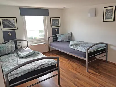 Ein Bett oder Betten in einem Zimmer der Unterkunft Loft-Unterkunft