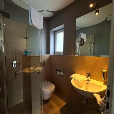 Ein Badezimmer in der Unterkunft Hotel Milú
