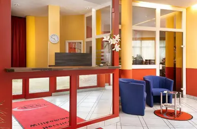 Ein Sitzbereich in der Unterkunft ates Hotel Lampertheim by AURUM