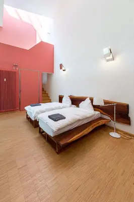 Ein Bett oder Betten in einem Zimmer der Unterkunft Darmstadt Loft