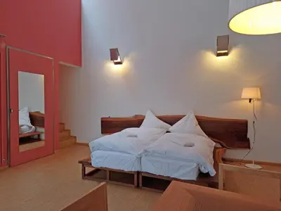 Ein Bett oder Betten in einem Zimmer der Unterkunft Darmstadt Loft