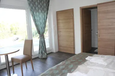 Ein Bett oder Betten in einem Zimmer der Unterkunft Hotel Pizzeria Da Beni