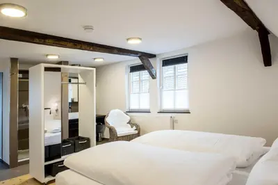 Ein Bett oder Betten in einem Zimmer der Unterkunft Ferienwohnung Stadtgarten