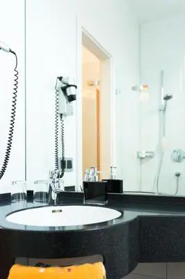 Ein Badezimmer in der Unterkunft Hotel-Pension Berger