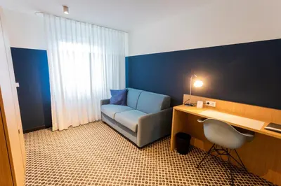 Ein Sitzbereich in der Unterkunft Hotel Otterbach