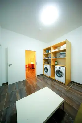 Ein Bett oder Betten in einem Zimmer der Unterkunft Connie's House Holiday Apartment
