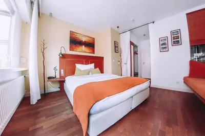 Ein Bett oder Betten in einem Zimmer der Unterkunft Hotel Zum Ochsen