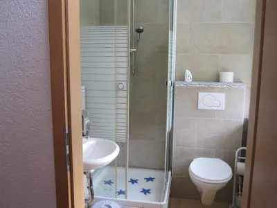 Ein Badezimmer in der Unterkunft Hotel Feiertag