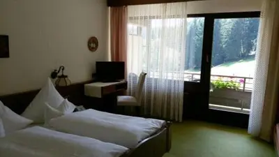 Ein Bett oder Betten in einem Zimmer der Unterkunft Hotel-Restaurant Jägerhof