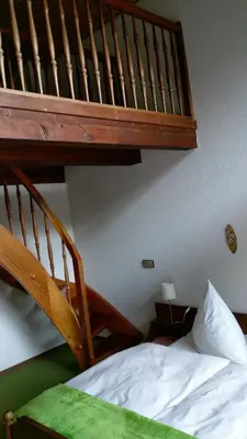 Ein Bett oder Betten in einem Zimmer der Unterkunft Hotel-Restaurant Jägerhof