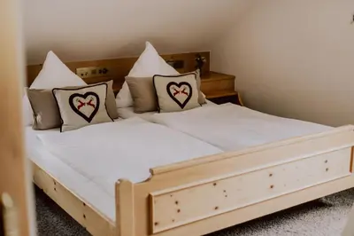 Ein Bett oder Betten in einem Zimmer der Unterkunft Hotel Zur alten Mühle