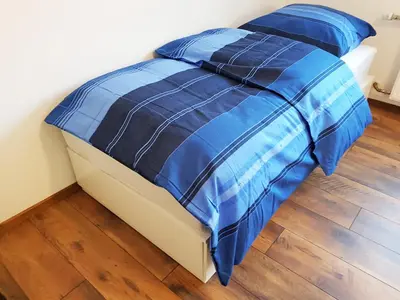 Ein Bett oder Betten in einem Zimmer der Unterkunft Monteurzimmer Obersulm