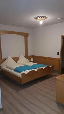 Ein Bett oder Betten in einem Zimmer der Unterkunft Hotel Paelzer Buwe