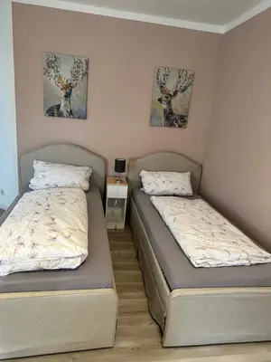 Ein Bett oder Betten in einem Zimmer der Unterkunft FeWo Am Neckarsteig