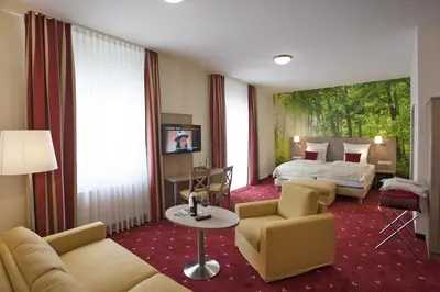 Ein Bett oder Betten in einem Zimmer der Unterkunft Zum Ochsen