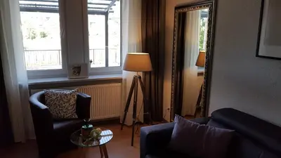 Ein Sitzbereich in der Unterkunft Ferienwohnung Eichelgasse Wertheim