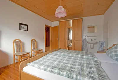 Ein Bett oder Betten in einem Zimmer der Unterkunft Ferienwohnungen Anneliese