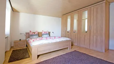 Ein Bett oder Betten in einem Zimmer der Unterkunft Ferienwohnungen Anneliese