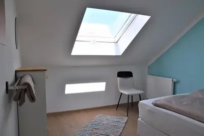 Ein Bett oder Betten in einem Zimmer der Unterkunft Ferienwohnung auf dem Dorf, Külsheim