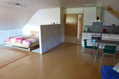 Ein Bett oder Betten in einem Zimmer der Unterkunft Enzkreisspitze