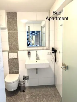 Ein Badezimmer in der Unterkunft Hotel Mythos 