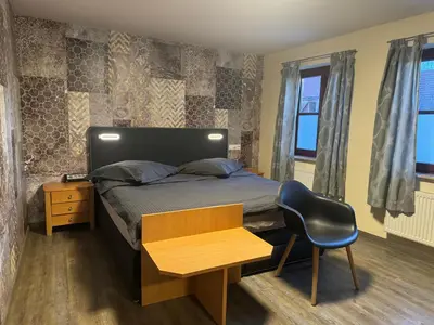 Ein Sitzbereich in der Unterkunft Hotel Mythos 