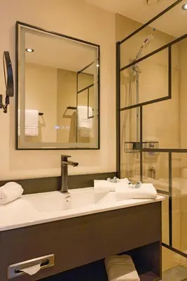 Ein Badezimmer in der Unterkunft Hotel Schloss Lehen