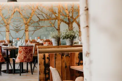 Ein Restaurant oder anderes Speiselokal in der Unterkunft Parkhotel Landau