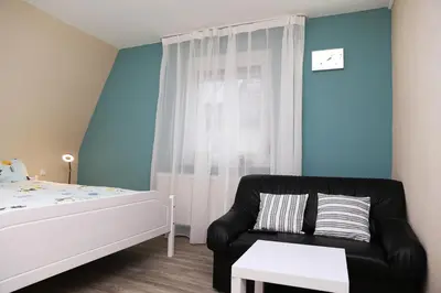 Ein Bett oder Betten in einem Zimmer der Unterkunft Charlotte Flat Heidelberg