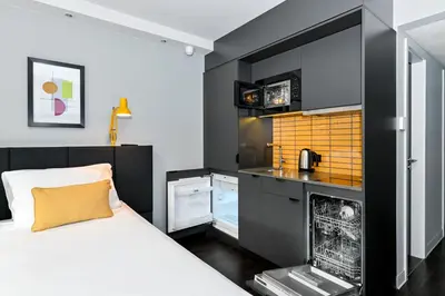 Ein Bett oder Betten in einem Zimmer der Unterkunft Staycity Aparthotels Heidelberg