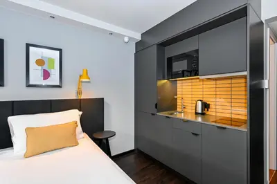Ein Bett oder Betten in einem Zimmer der Unterkunft Staycity Aparthotels Heidelberg