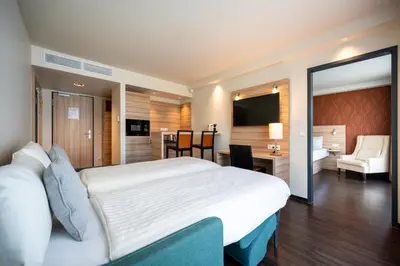 Ein Bett oder Betten in einem Zimmer der Unterkunft Staycity Aparthotels Heidelberg